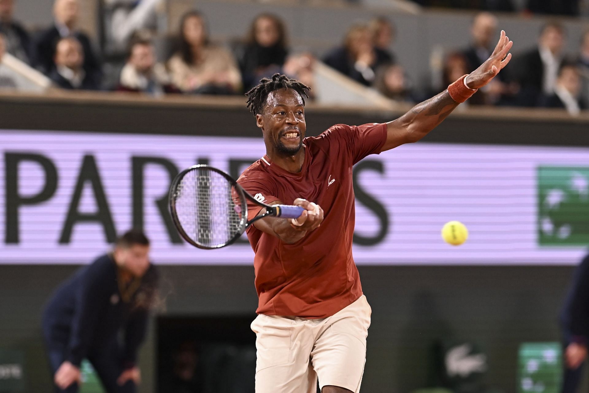 Gael Monfils hits a forehand during French Open 1R win | Image Source: Getty